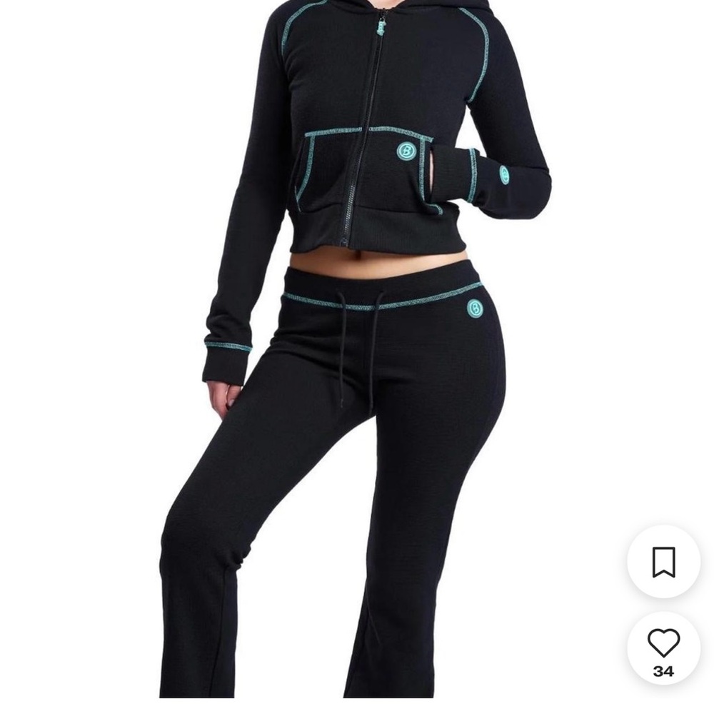 Body by Raven black with Tiffany, blue trim waffle track suit.